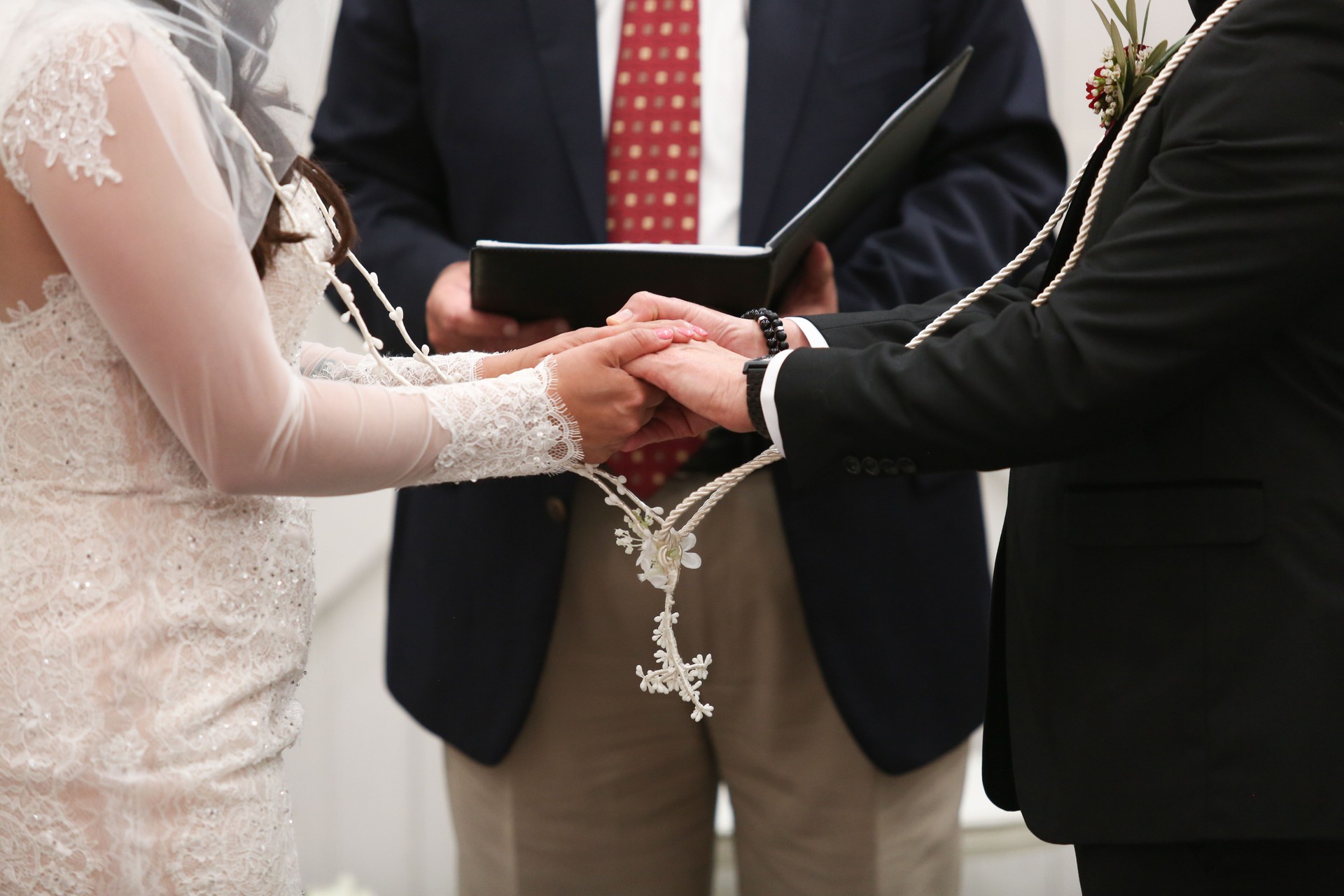 Holding hands at Wedding